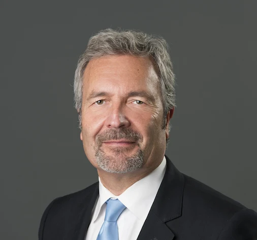 Justice Glenn D. Joyal in business attire