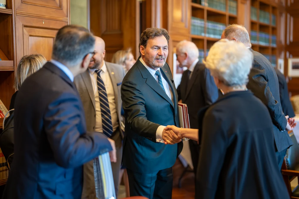Chief Justice Richard Wagner and Justice Mahmud Jamal greet Lady Vivien Rose